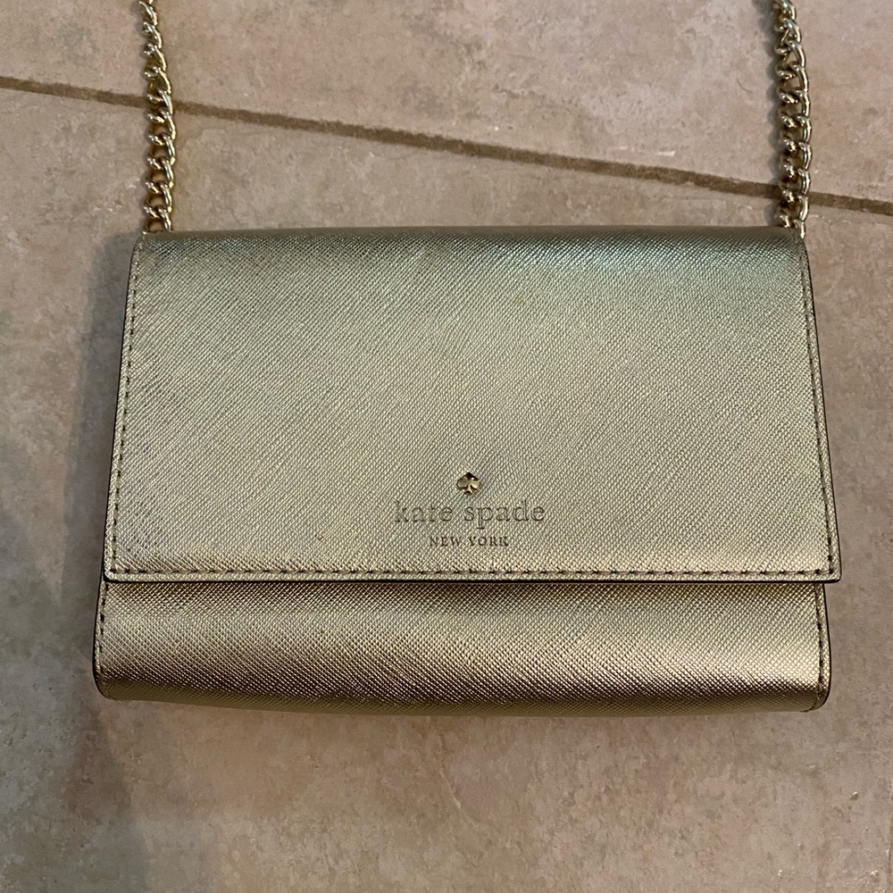 Gold Kate Spade clutch